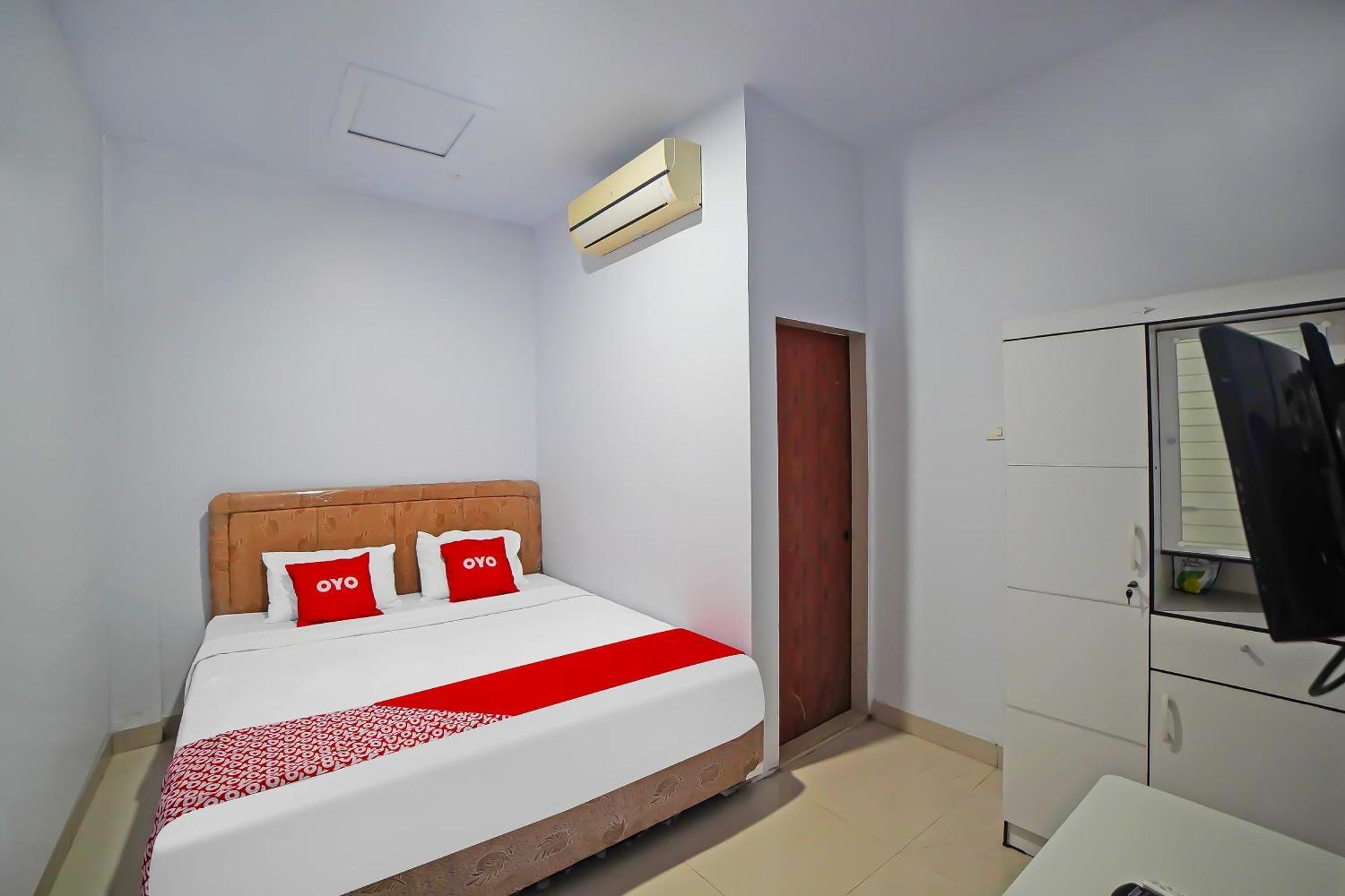 Hotel Oyo 92342 Batik Traveller 2*